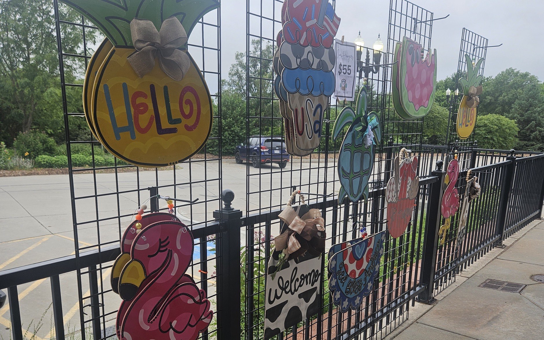 Handmade door hangers on display at a community event in Unadilla, Nebraska