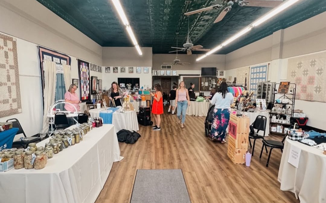 Neighbors gathered at a Small Town Saturdays market in Unadilla, Nebraska